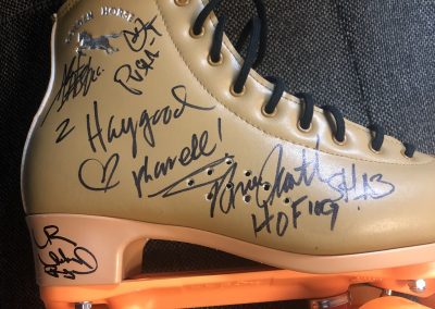 Roller skate signed by Pharrell, Pusha T, and other local celebrities